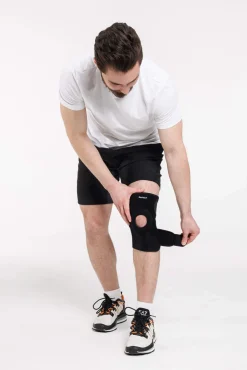 DrFit Zapinany stabilizator kolana z neoprenu z otworem na rzepkę