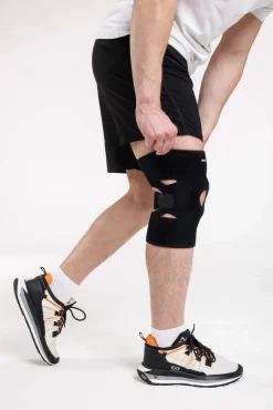 DrFit Zapinany stabilizator kolana z neoprenu z otworem na rzepkę